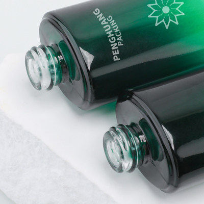 Glas-Lotions-Flasche der Schönheits-55ml bereifte Lotion, die kosmetisches Flaschen-Geschenk Verpackengrün Skincare einstellte