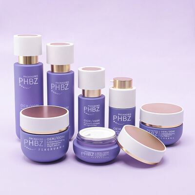 Komplexe Kosmetikverpackung mit Luxus-Glasflaschen goldene Kappe Lotion Flaschen Creme-Gläser und kosmetische Verpackung