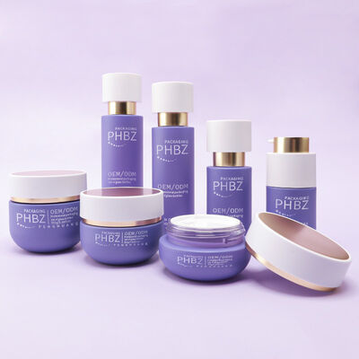 Komplexe Kosmetikverpackung mit Luxus-Glasflaschen goldene Kappe Lotion Flaschen Creme-Gläser und kosmetische Verpackung