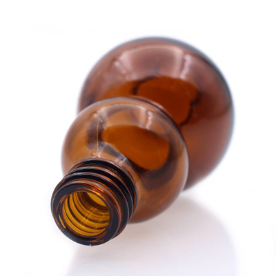 Glasbernsteinfarbiger Cucurbit Farbe der Flasche des ätherischen Öls formte