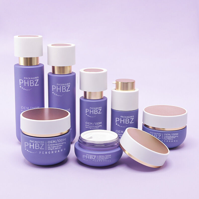 Komplexe Kosmetikverpackung mit Luxus-Glasflaschen goldene Kappe Lotion Flaschen Creme-Gläser und kosmetische Verpackung